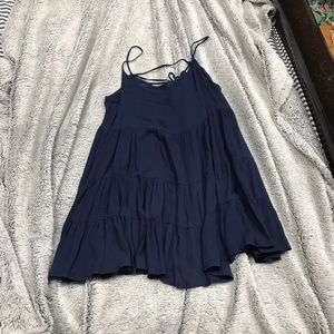 Blue dress. Ruffle tears.